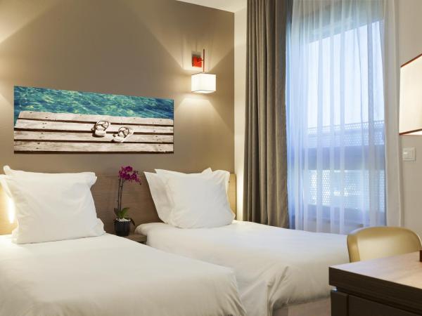 Nehô Suites Porte de Genève - Gare Annemasse : photo 4 de la chambre studio