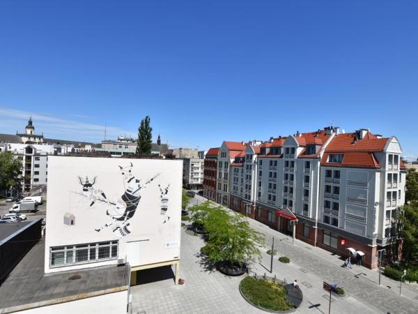 City Central Hostel - Pokoje prywatne : photo 5 de la chambre chambre quadruple avec salle de bains commune