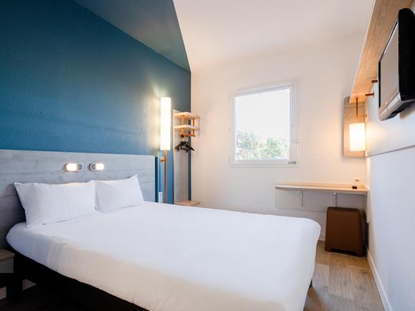 Ibis Budget Perpignan Nord Rivesaltes : photo 1 de la chambre chambre double standard avec lit superposé