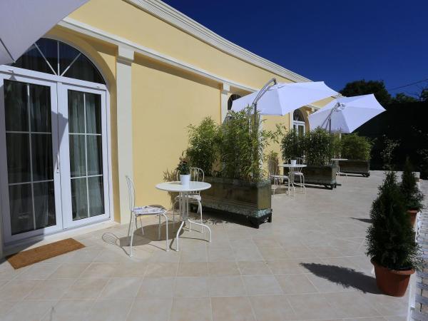 Guesthouse Villa Maggie : photo 9 de la chambre chambre lits jumeaux avec terrasse