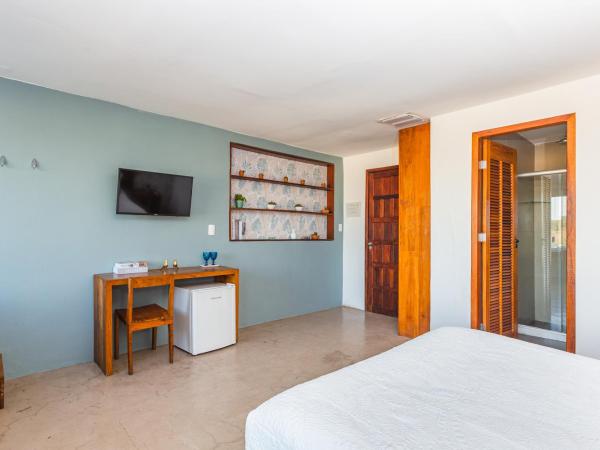 Santa Vista Rio : photo 7 de la chambre suite lit queen-size avec baignoire spa