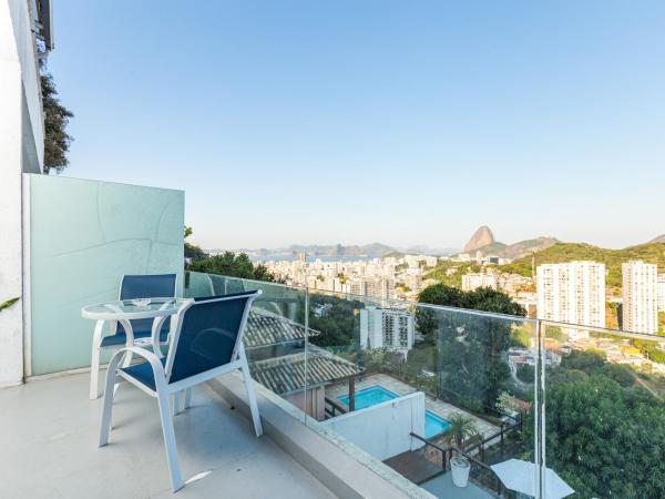 Santa Vista Rio : photo 8 de la chambre suite lit queen-size avec baignoire spa