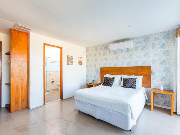 Santa Vista Rio : photo 7 de la chambre suite lit queen-size avec baignoire spa