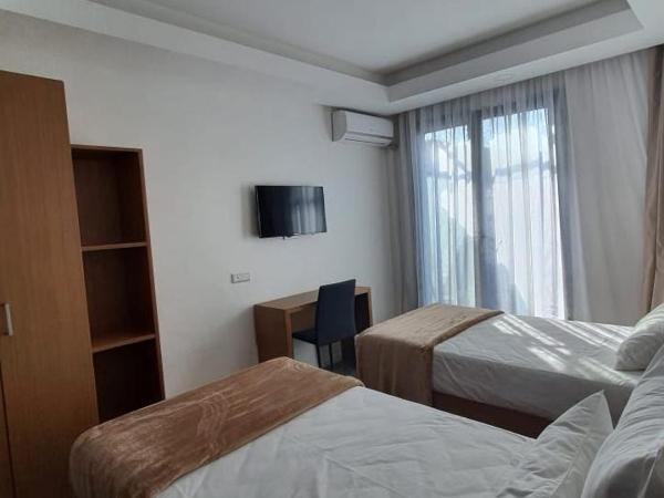 Casa City Break Appart hôtel : photo 4 de la chambre studio avec lits jumeaux