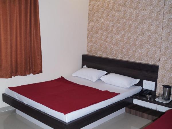 Shree Akshar Restaurant and Hotel : photo 10 de la chambre chambre triple deluxe