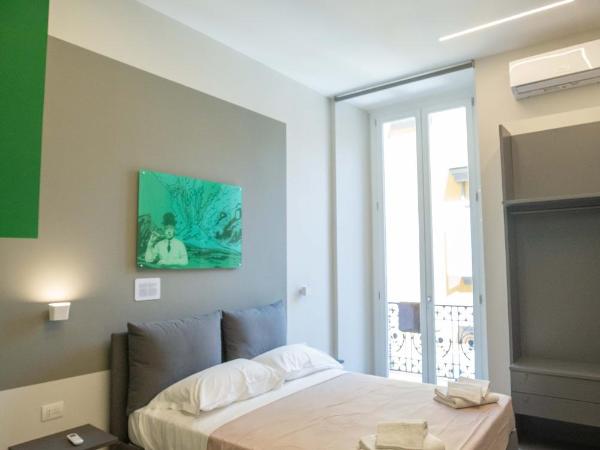 Napoli è....... By Dimorra : photo 2 de la chambre chambre triple - vue sur ville