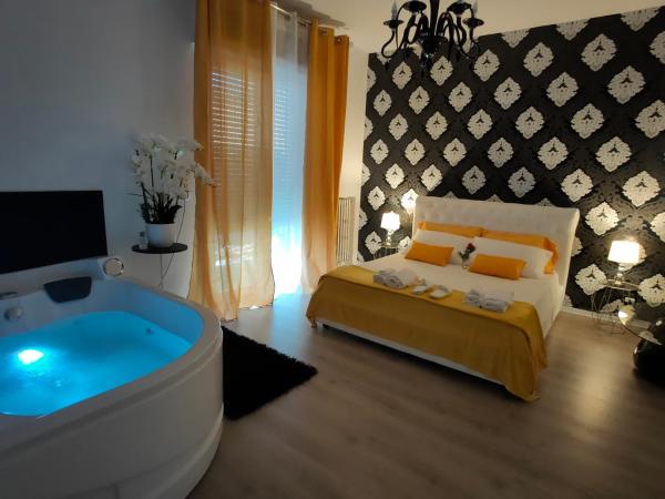 Cavaliere Suite : photo 5 de la chambre chambre lit queen-size avec baignoire spa