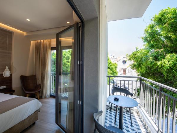 Metropole Urban Hotel : photo 6 de la chambre chambre de luxe avec balcon - vue sur ville