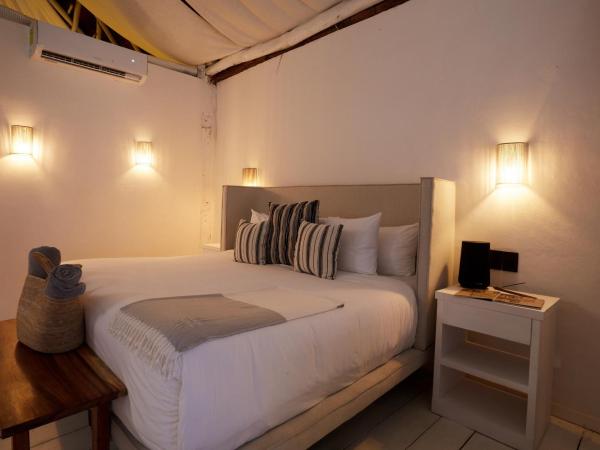 Roc Luxe Tulum : photo 3 de la chambre suite lit king-size - vue sur mer