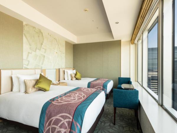 Hotel Metropolitan Tokyo Marunouchi : photo 1 de la chambre chambre lits jumeaux - vue sur ville