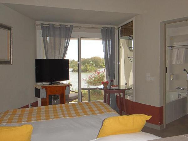 Hôtel L' Estelle en Camargue : photo 10 de la chambre chambre quadruple