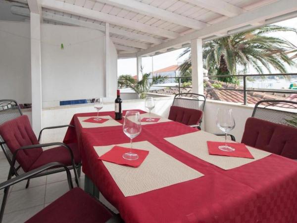 Apartments PALMA Bed & Breakfast : photo 4 de la chambre chambre quadruple - vue sur mer