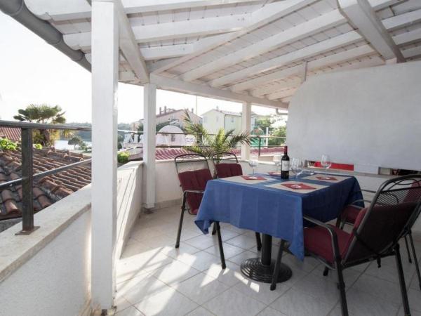 Apartments PALMA Bed & Breakfast : photo 9 de la chambre chambre quadruple - vue sur mer