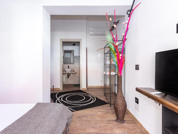 Living G Room : photo 8 de la chambre chambre double avec terrasse