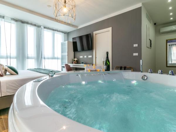 4 Star Suite SPA - Self Check-In : photo 4 de la chambre suite deluxe avec baignoire spa