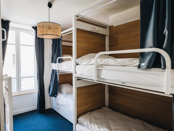 Les Chouettes Hostel : photo 2 de la chambre lit dans dortoir mixte de 6 lits