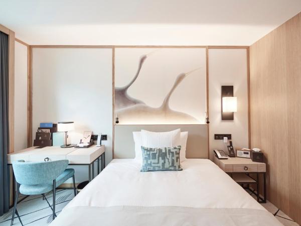 Storchen Zürich - Lifestyle boutique Hotel : photo 1 de la chambre hébergement familial citadin avec 2 chambres