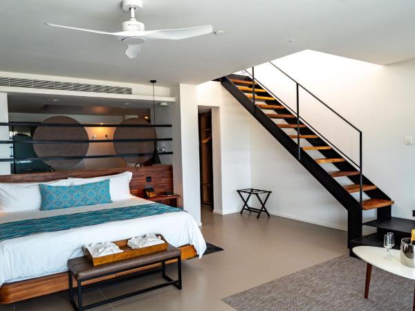 Majestic Elegance Costa Mujeres - All Inclusive : photo 2 de la chambre suite avec fenêtre de toit et jacuzzi extérieur (réservée aux adultes de 18 ans et plus) - connexion wi-fi gratuite