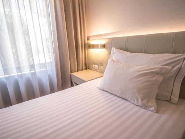 Hotel Travel Park Lisboa : photo 5 de la chambre chambre double ou lits jumeaux avec parking gratuit