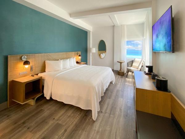 Marseilles Beachfront Hotel : photo 5 de la chambre hébergement signature lit king-size - vue sur océan