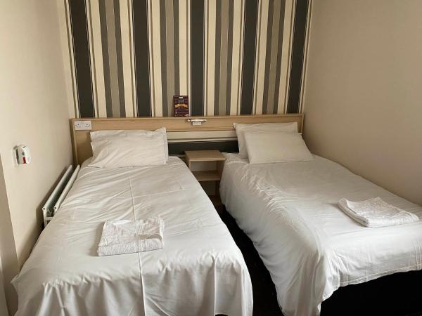Arncliffe Lodge Hotel : photo 2 de la chambre chambre lits jumeaux