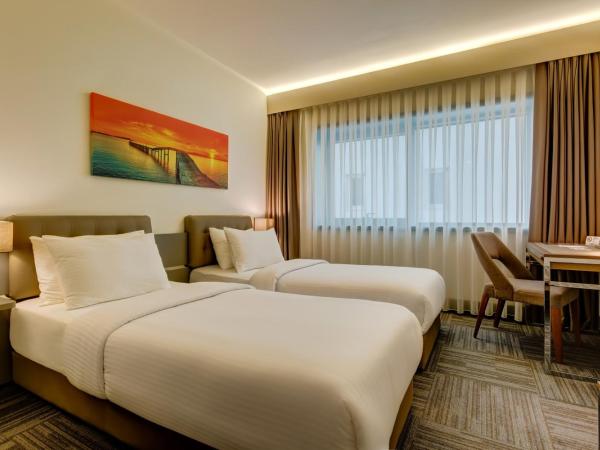 Plus Hotel Bostanci Atasehir : photo 3 de la chambre chambre double ou lits jumeaux