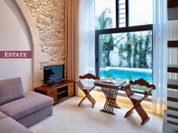 Rimondi Boutique Hotel - Small Luxury Hotels of the World : photo 4 de la chambre suite - vue sur piscine - domaine