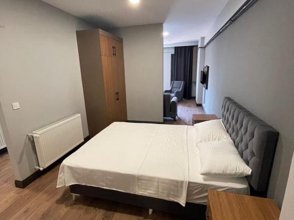 Almina Apartments&Suites : photo 3 de la chambre chambre triple confort