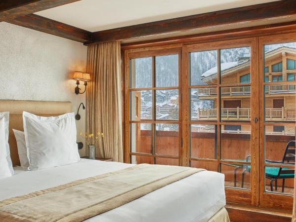 Airelles Val d'Isère : photo 1 de la chambre suite familiale avec balcon