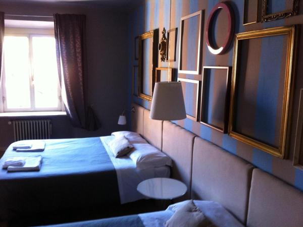 Residenza Navona Verona : photo 1 de la chambre chambre double Économique avec lit d'appoint