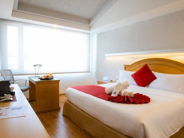 Hotel Horizon & Convention Center : photo 4 de la chambre chambre lit king-size deluxe