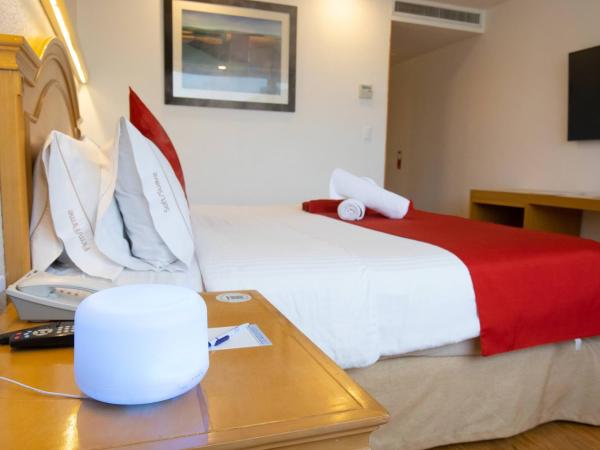 Hotel Horizon & Convention Center : photo 6 de la chambre chambre lit king-size deluxe