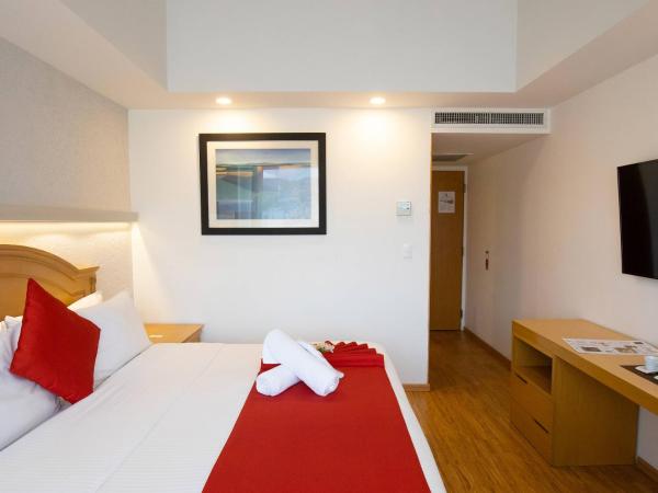 Hotel Horizon & Convention Center : photo 5 de la chambre chambre lit king-size deluxe