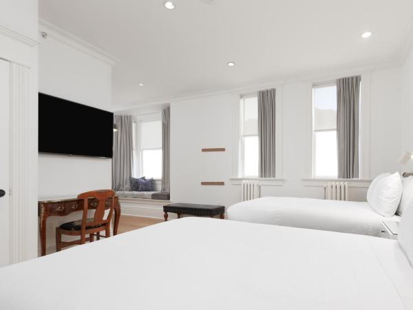 Victorian Hotel : photo 2 de la chambre hébergement 2 lits doubles supérieur (salle de bains privative)