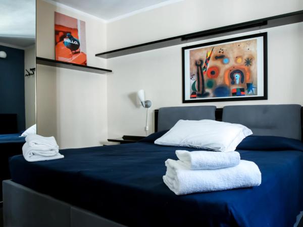 Hotel Britannia : photo 3 de la chambre chambre quadruple avec salle de bains privative
