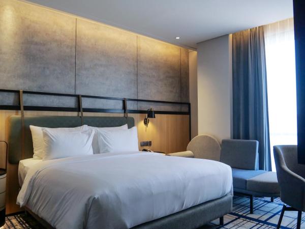 Mercure Surabaya Manyar : photo 2 de la chambre premium superior queen room - city side