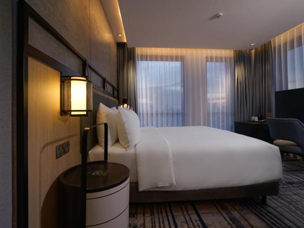 Mercure Surabaya Manyar : photo 3 de la chambre premium superior queen room - city side