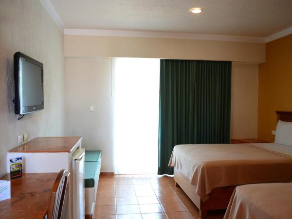 Tecnohotel Mérida Norte : photo 3 de la chambre chambre double ou lits jumeaux - vue sur jardin