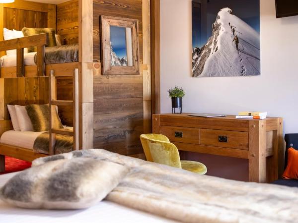 Hôtel Ski Lodge - Village Montana : photo 5 de la chambre chambre quadruple avec balcon pour 3 adultes (13 ans et plus)