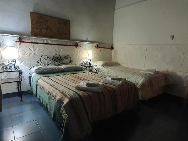 Sayta Hostal : photo 6 de la chambre chambre triple avec salle de bains privative