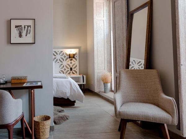 Hotel Casa Once : photo 3 de la chambre suite deluxe avec lit king-size