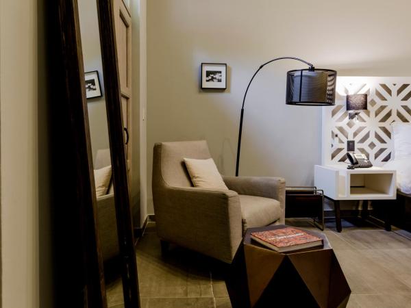 Hotel Casa Once : photo 1 de la chambre suite lit king-size