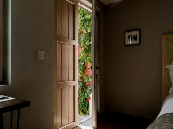 Hotel Casa Once : photo 4 de la chambre chambre double deluxe (2 adultes + 1 enfant)