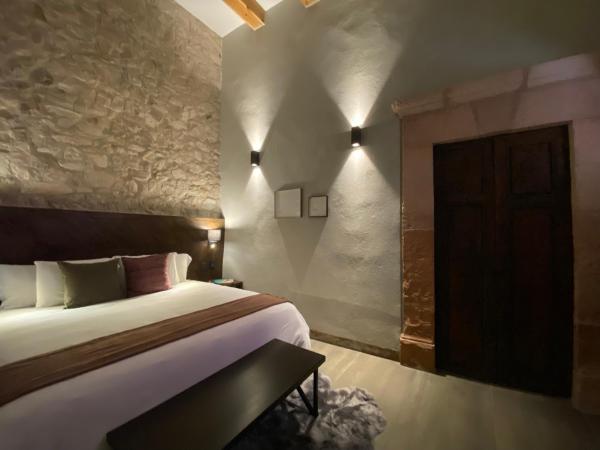 Hotel Casa Once : photo 9 de la chambre suite lit queen-size