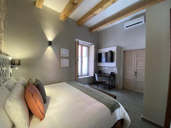 Hotel Casa Once : photo 9 de la chambre suite deluxe avec lit king-size