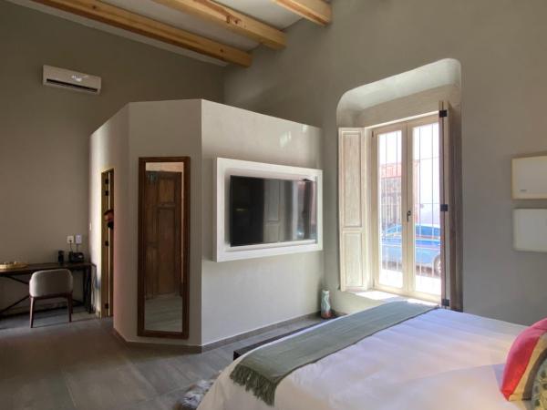 Hotel Casa Once : photo 6 de la chambre suite lit king-size