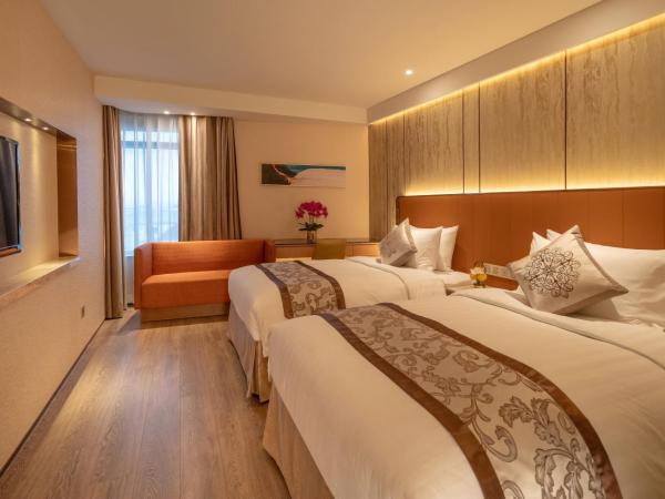 Hotel Golden Dragon : photo 2 de la chambre chambre lits jumeaux - vue sur port