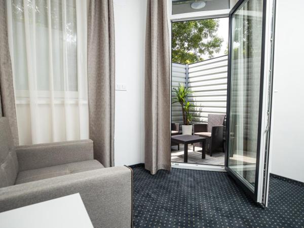 Arena Deluxe & Spa : photo 6 de la chambre chambre double avec patio