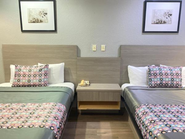 Island Suites Hobby Airport : photo 6 de la chambre suite avec 2 lits queen-size