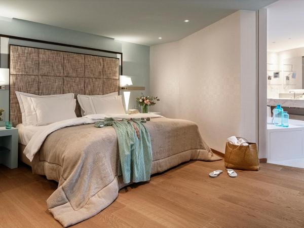 Hotel Eden Roc - The Leading Hotels of the World : photo 2 de la chambre suite supérieure - vue sur lac